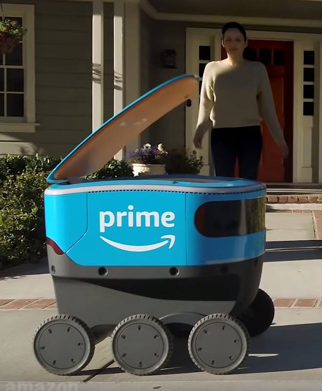 Amazon prime купить. Робот Amazon Prime. Amazon Scout робот. Робот курьер Амазон. Amazon доставка.